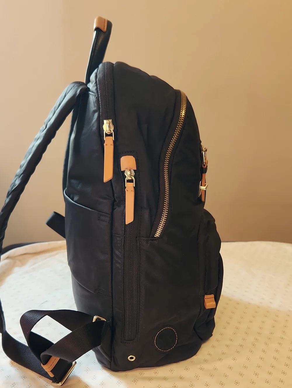 Tumi Voyager Harper Black Backpack with Tan Leather Accents